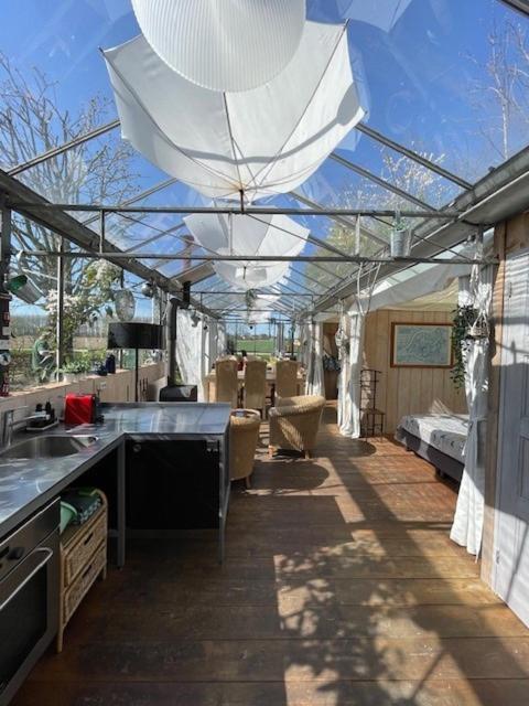 Vrijstaande Accommodatie Glamping De Kas Inn Hank Exterior photo